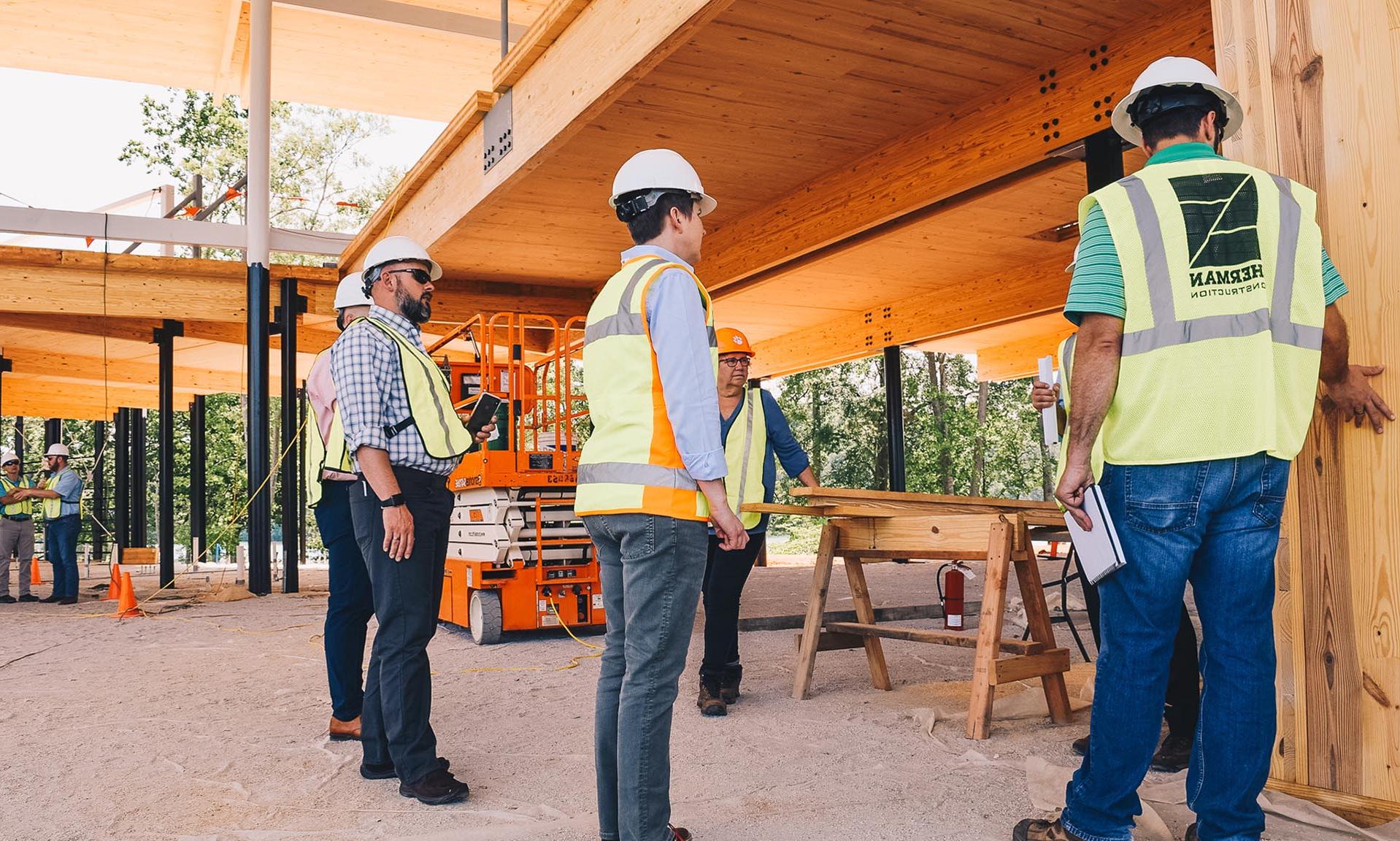 Andy Quattlebaum under construction with workers